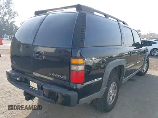 2004 Chevrolet Suburban LT z VIN 3GNFK16T44G206586, wystawiony jako IAAI lot #41480840 z przebiegiem Nie podano mil oraz . Historia ofert i sprzedaży dostępna na DreamBid. Obrazek 4.