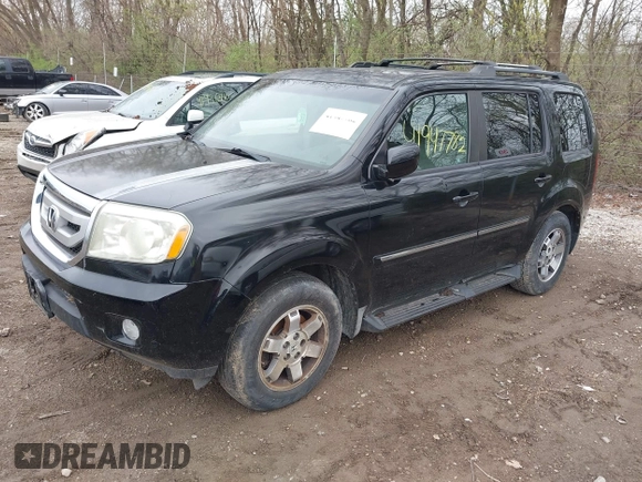 2009 Honda Pilot Touring with VIN 5FNYF48959B016978, listed as a IAAI auction lot 41947782 with 234,115 mi miles and . Bid and sale history available at carsss.com. Image 18.