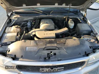 2005 GMC Yukon SLE with VIN 1GKEC13TX5J151930, listed as a Copart auction lot 73030094 with 216,351 mi miles and Clean Title. Bid and sale history available at carsss.com. Image 12.