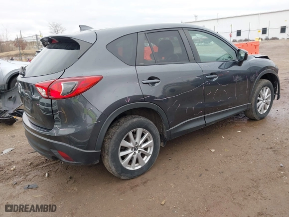 2016 Mazda CX-5 Touring with VIN JM3KE4CY7G0715507, listed as a IAAI auction lot 41699610 with 108,206 mi miles. Bid and sale history available at carsss.com. Image 4.