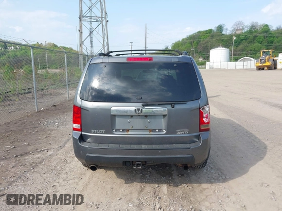 2011 Honda Pilot Touring with VIN 5FNYF4H90BB103824, listed as a IAAI auction lot 42127137 with 243,858 mi miles and . Bid and sale history available at carsss.com. Image 16.
