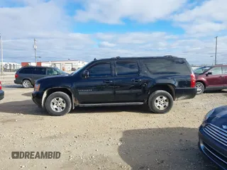 2014 Chevrolet Suburban LT with VIN 1GNSKJE71ER232700, listed as a IAAI auction lot 40812602 with 245,852 mi miles and . Bid and sale history available at DreamBid. Image 14.