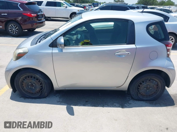 2012 Scion iQ with VIN JTNJJXB07CJ018562, listed as a IAAI auction lot 42404672 with 79,867 mi miles and . Bid and sale history available at DreamBid. Image 15.
