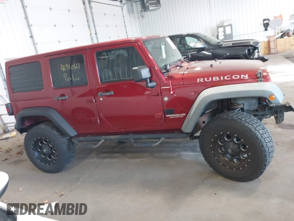 2011 Jeep Wrangler Unlimited Rubicon with VIN 1J4BA6H18BL584486, listed as a IAAI auction lot 42340661 with 152,896 mi miles and . Bid and sale history available at DreamBid. Image 13.