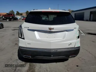 2021 Cadillac XT5 AWD Sport with VIN 1GYKNHRS2MZ156923, listed as a Copart auction lot 52696375 with 19,619 mi miles and Salvage title. Bid and sale history available at DreamBid. Image 6.