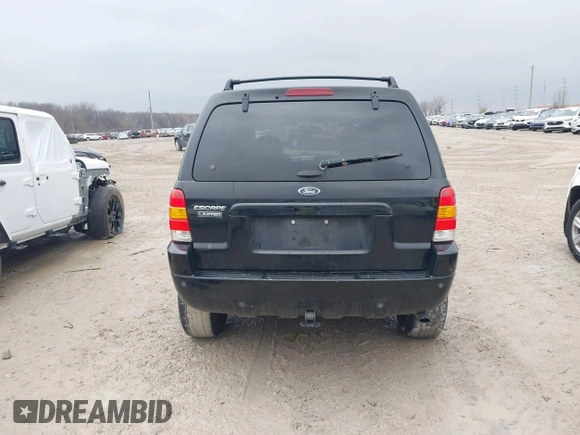 2004 Ford Escape Limited with VIN 1FMCU94124KA36321, listed as a IAAI auction lot 41565490 with 203,933 mi miles. Bid and sale history available at carsss.com. Image 16.