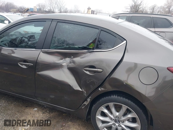 2014 Mazda 3 S Touring with VIN JM1BM1V31E1111499, listed as a IAAI auction lot 41476457 with 109,337 mi miles and . Bid and sale history available at DreamBid. Image 6.
