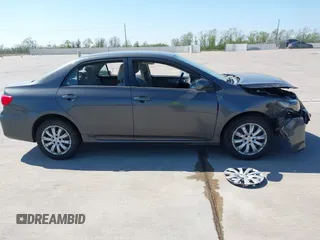 2012 Toyota Corolla L with VIN 2T1BU4EE9CC831743, listed as a IAAI auction lot 41870966 with 166,548 mi miles. Bid and sale history available at carsss.com. Image 13.