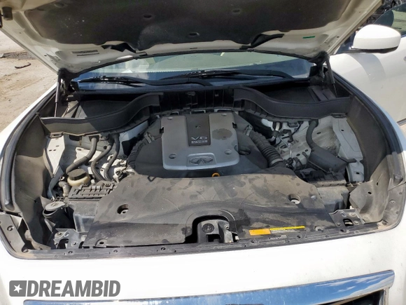 2014 Infiniti QX70 z VIN JN8CS1MU7EM450565, wystawiony jako Copart lot #55931325 z przebiegiem 159 813 mil mil oraz Szkoda całkowita • Salvage title. Historia ofert i sprzedaży dostępna na DreamBid. Obrazek 12.