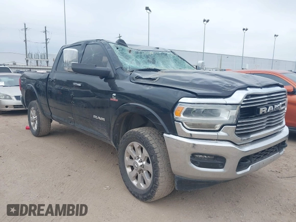 2020 Ram 2500 Laramie z VIN 3C6UR5FL6LG284652, wystawiony jako IAAI lot #41536970 z przebiegiem 92 566 mil mil oraz . Historia ofert i sprzedaży dostępna na DreamBid. Obrazek 1.