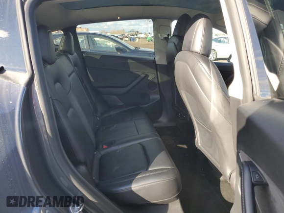 2022 Tesla Model Y Long Range with VIN 7SAYGDEE7NF386082, listed as a Copart auction lot 47191625 with 73,634 mi miles and Salvage Title. Bid and sale history available at carsss.com. Image 10.
