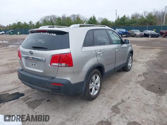 2013 Kia Sorento EX with VIN 5XYKUCA67DG380083, listed as a IAAI auction lot 41957996 with 73,598 mi miles and . Bid and sale history available at DreamBid. Image 4.