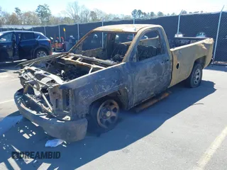2014 Chevrolet Silverado 1500 Work Truck with VIN 1GCNCPEH0EZ272958, listed as a IAAI auction lot 41801400 with 130,363 mi miles and . Bid and sale history available at DreamBid. Image 2.