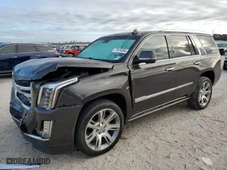 2015 Cadillac Escalade Premium with VIN 1GYS3NKJ2FR722538, listed as a Copart auction lot 77674394 with 130,718 mi miles and Salvage Title. Bid and sale history available at carsss.com. Image 1.