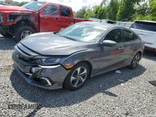 2020 Honda Civic LX z VIN 2HGFC2F63LH602210, wystawiony jako Copart lot #51564385 z przebiegiem 31 554 mil mil oraz Szkoda całkowita • Salvage title. Historia ofert i sprzedaży dostępna na DreamBid. Obrazek 1.