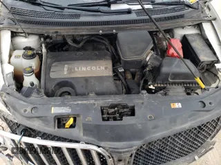 2012 Lincoln MKX with VIN 2LMDJ8JKXCBL19695, listed as a Copart auction lot 43960855 with 94,151 mi miles and Salvage Title. Bid and sale history available at DreamBid. Image 12.