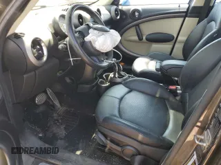 2012 MINI Countryman S z VIN WMWZC5C52CWL55608, wystawiony jako Copart lot #56424275 z przebiegiem 126 669 mil mil oraz Szkoda całkowita • Salvage title. Historia ofert i sprzedaży dostępna na DreamBid. Obrazek 7.