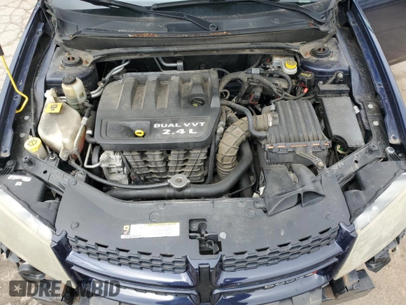 2013 Dodge Avenger SXT with VIN 1C3CDZCB5DN711788, listed as a Copart auction lot 58765155 with 144,510 mi miles and Salvage title. Bid and sale history available at DreamBid. Image 11.