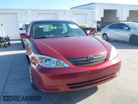 2004 Toyota Camry LE with VIN 4T1BE32KX4U272768, listed as a IAAI auction lot 42006421 with 204,386 mi miles. Bid and sale history available at carsss.com. Image 12.