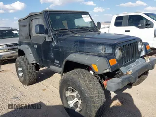 2005 Jeep Wrangler X z VIN 1J4FA39S45P348955, wystawiony jako IAAI lot #42397630 z przebiegiem 63 209 mil mil oraz . Historia ofert i sprzedaży dostępna na DreamBid. Obrazek 1.