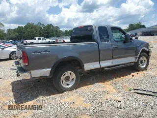 2002 Ford F-150 XL z VIN 1FTRX18L52NB59531, wystawiony jako Copart lot #58550365 z przebiegiem 267 424 mil mil oraz Szkoda całkowita • Salvage title. Historia ofert i sprzedaży dostępna na DreamBid. Obrazek 3.
