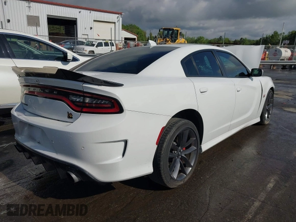 2019 Dodge Charger Scat Pack with VIN 2C3CDXGJ3KH558856, listed as a IAAI auction lot 42009847 with 62,546 mi miles and . Bid and sale history available at DreamBid. Image 4.