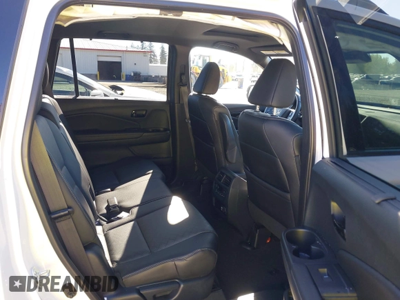 2023 Honda Passport Elite with VIN 5FNYF8H01PB004087, listed as a IAAI auction lot 42045433 with 20,677 mi miles and . Bid and sale history available at DreamBid. Image 8.