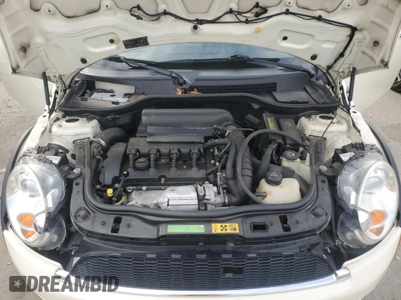 2007 MINI Hardtop S with VIN WMWMF735X7TL83242, listed as a Copart auction lot 41609565 with 83,320 mi miles and Salvage Title. Bid and sale history available at DreamBid. Image 11.