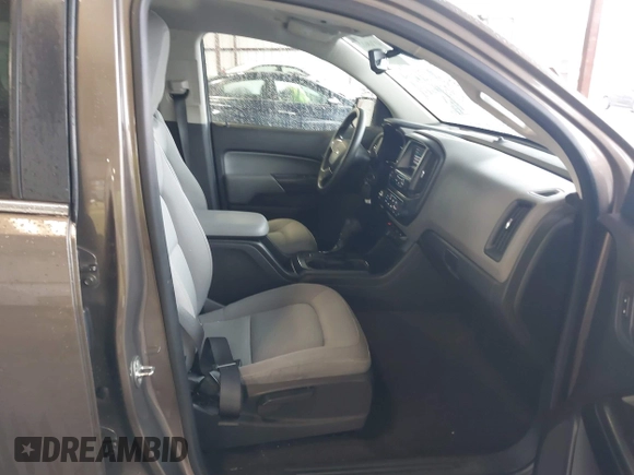 2015 Chevrolet Colorado 2WD WT z VIN 1GCGSAE34F1270479, wystawiony jako IAAI lot #41768612 z przebiegiem 158 984 mil mil oraz . Historia ofert i sprzedaży dostępna na DreamBid. Obrazek 5.