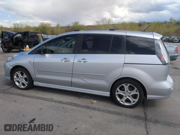 2009 Mazda 5 Grand Touring with VIN JM1CR293390335231, listed as a Copart auction lot 55560285 with 96,502 mi miles and Salvage title. Bid and sale history available at DreamBid. Image 2.