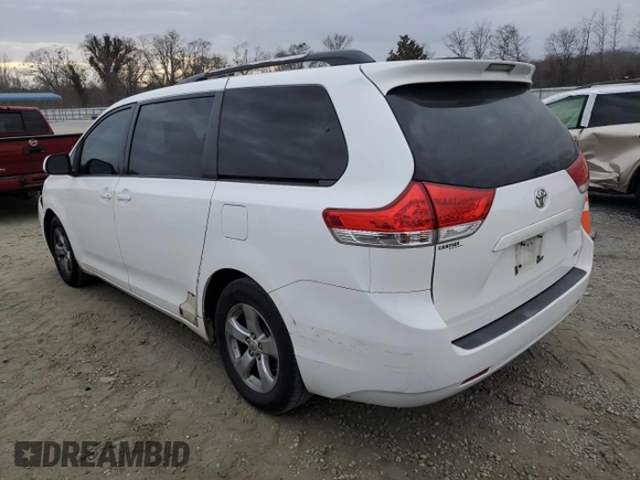 2012 Toyota Sienna LE AAS with VIN 5TDKK3DC1CS224663, listed as a Copart auction lot 47818225 with 214,883 mi miles and Clean Title. Bid and sale history available at carsss.com. Image 2.