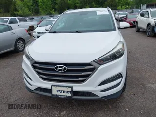 2016 Hyundai Tucson Limited with VIN KM8J33A23GU215481, listed as a IAAI auction lot 42202341 with 97,693 mi miles. Bid and sale history available at carsss.com. Image 12.