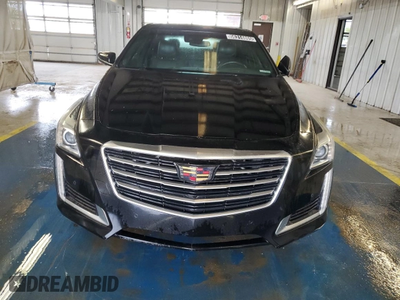 2015 Cadillac CTS Premium AWD z VIN 1G6AZ5S3XF0127669, wystawiony jako Copart lot #56314865 z przebiegiem 211 973 mil mil oraz Czysty tytuł • Clean title. Historia ofert i sprzedaży dostępna na DreamBid. Obrazek 5.