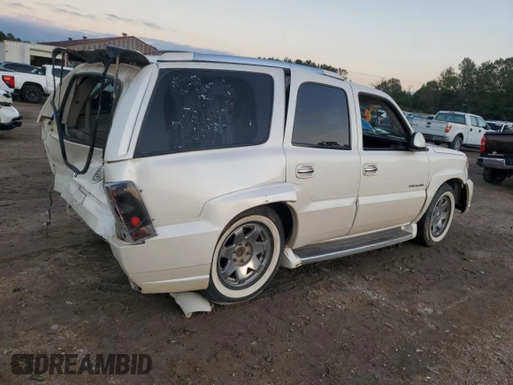2003 Cadillac Escalade z VIN 1GYEC63T63R139405, wystawiony jako Copart lot #88884095 z przebiegiem Nie podano mil oraz Szkoda całkowita • Salvage title. Historia ofert i sprzedaży dostępna na DreamBid. Obrazek 3.