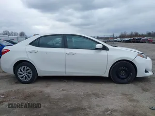 2019 Toyota Corolla L with VIN 5YFBURHE0KP889909, listed as a IAAI auction lot 41888953 with 130,529 mi miles. Bid and sale history available at carsss.com. Image 13.