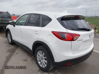 2015 Mazda CX-5 Touring with VIN JM3KE2CY3F0550624, listed as a IAAI auction lot 41931268 with 51,588 mi miles and . Bid and sale history available at carsss.com. Image 3.
