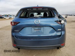 2017 Mazda CX-5 Sport with VIN JM3KFABL1H0116055, listed as a Copart auction lot 45044725 with 100,901 mi miles and Salvage Title. Bid and sale history available at carsss.com. Image 6.