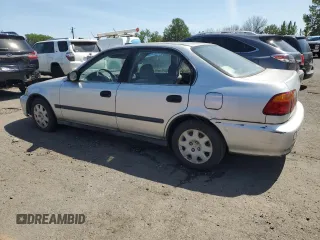 1999 Honda Civic LX with VIN 2HGEJ6673XH504043, listed as a Copart auction lot 55201185 with 220,352 mi miles and Clean Title. Bid and sale history available at carsss.com. Image 2.
