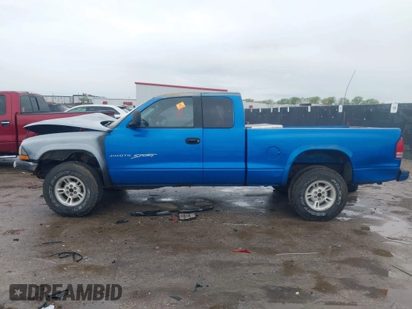 1998 Dodge Dakota SLT z VIN 1B7GG22YXWS683170, wystawiony jako IAAI lot #41903787 z przebiegiem Nie podano mil oraz . Historia ofert i sprzedaży dostępna na DreamBid. Obrazek 14.