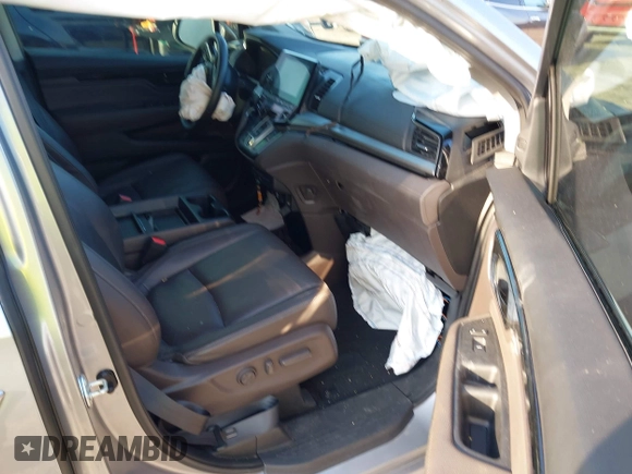 2023 Honda Odyssey Touring with VIN 5FNRL6H86PB020700, listed as a IAAI auction lot 41961098 with 66,512 mi miles and . Bid and sale history available at DreamBid. Image 5.