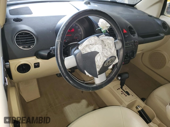 2009 Volkswagen Beetle S with VIN 3VWRG31Y39M402031, listed as a Copart auction lot 57285455 with 101,220 mi miles and Salvage title. Bid and sale history available at DreamBid. Image 8.