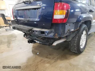 2002 Jeep Grand Cherokee Laredo with VIN 1J8GW48S92C197903, listed as a Copart auction lot 70524292 with 152,286 mi miles and Non Repairable. Bid and sale history available at carsss.com. Image 9.