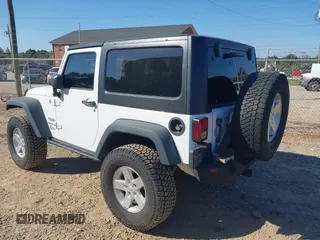 2014 Jeep Wrangler Sport with VIN 1C4AJWAG5EL176998, listed as a IAAI auction lot 40585450 with 114,432 mi miles and . Bid and sale history available at DreamBid. Image 3.