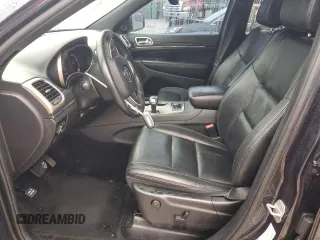 2014 Jeep Grand Cherokee Limited with VIN 1C4RJFBG2EC233725, listed as a Copart auction lot 58524505 with 216,798 mi miles and Salvage title. Bid and sale history available at DreamBid. Image 7.