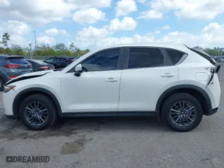 2020 Mazda CX-5 Touring with VIN JM3KFACM6L1820441, listed as a IAAI auction lot 41579634 with 55,416 mi miles. Bid and sale history available at carsss.com. Image 15.