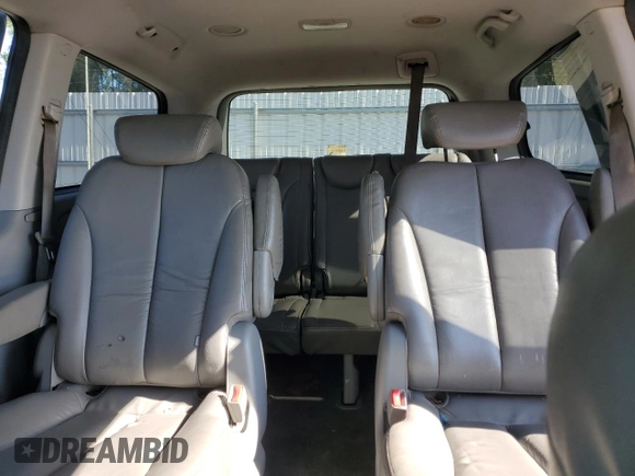 2008 Kia Sedona LX with VIN KNDMB233586210180, listed as a Copart auction lot 52090305 with 220,428 mi miles and Salvage Title. Bid and sale history available at carsss.com. Image 10.