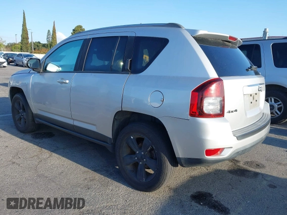 2014 Jeep Compass Sport with VIN 1C4NJDBB4ED567515, listed as a IAAI auction lot 42138801 with 183,673 mi miles. Bid and sale history available at carsss.com. Image 3.