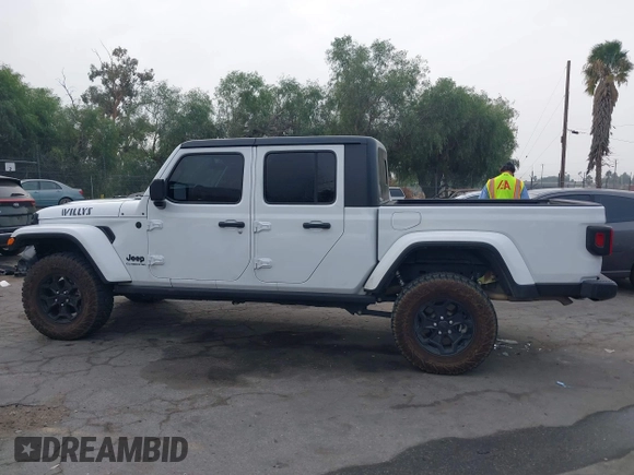 2021 Jeep Gladiator Willys с VIN 1C6HJTAG6ML619730, выставлен на аукционе IAAI как лот 41172494 с пробегом 40 360 миль миль и . История ставок и продаж доступна на DreamBid. Изображение 14.
