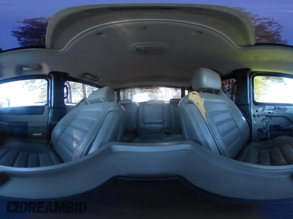 2005 Hummer H2 SUT with VIN 5GRGN22UX5H106653, listed as a IAAI auction lot 42015559 with 180,519 mi miles. Bid and sale history available at carsss.com. Image 18.