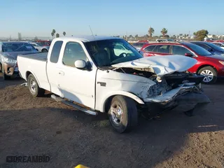 2003 Ford F-150 Heritage XL with VIN 2FTRX17W03CA25609, listed as a IAAI auction lot 41221482 with 1 mi miles. Bid and sale history available at carsss.com. Image 1.